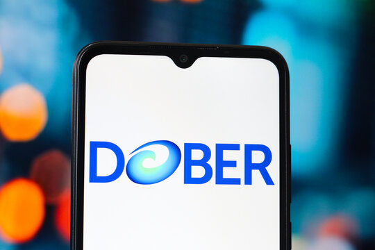 In this photo illustration, the Dober logo is seen displayed on a smartphone screen.