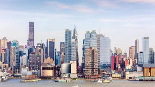 Midtown Manhattan skyline panning timelapse of New York City including 42nd street canyon and Hudson Yards neighborhood in New York city.