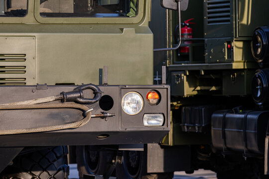 Military equipment and army equipment.. Examination uncovers military transport safety details. Thorough inspection highlights crucial safety features and maintenance characteristics