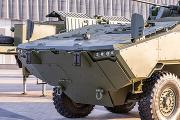 Military equipment and army equipment.. Exhibition featuring combat vehicles with defense and industrial capabilities. Event presenting armored reconnaissance units equipped with advanced © NastyaPhoto