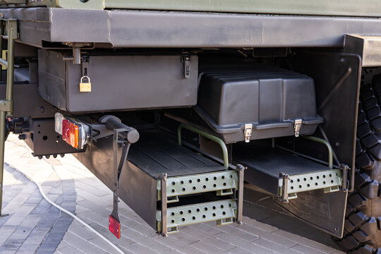 Military equipment and army equipment.. Highlighting safety locking systems and efficient storage in military vehicles. Displaying advanced security locks and systematic storage solutions