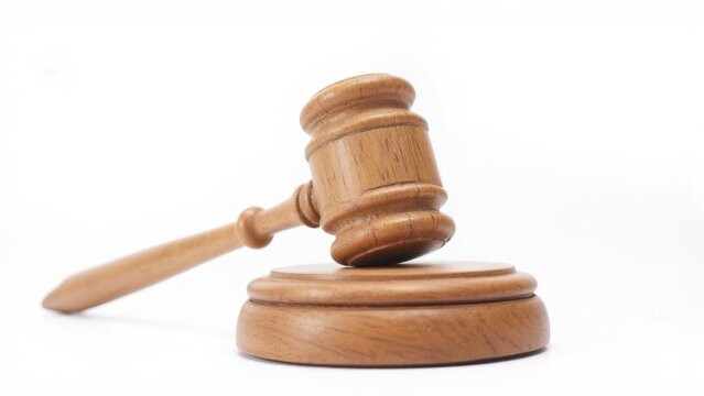 Close-up of wooden gavel and stand.