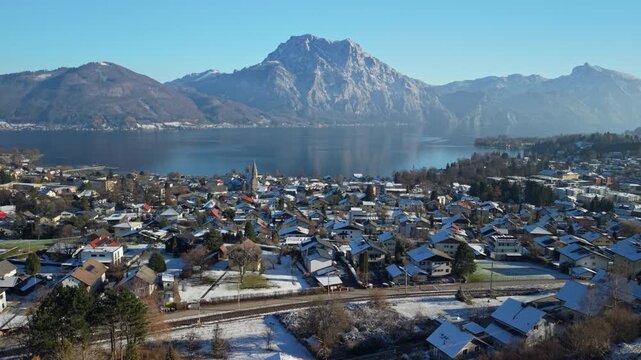 Aerial view of Altm&uuml;nster village and Traunsee lake in winter wonderland, Austria