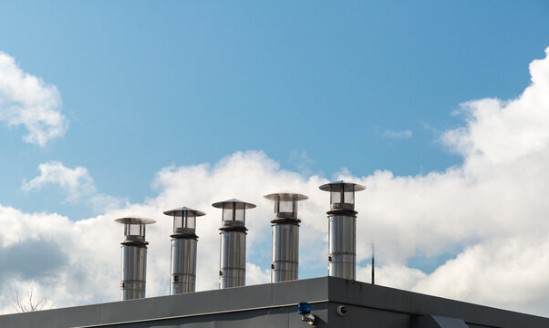 Canada, BC, Vancouver.  Steam vents atop pressure regulation structure.  Part of the River District low-carbon, steam energy system.