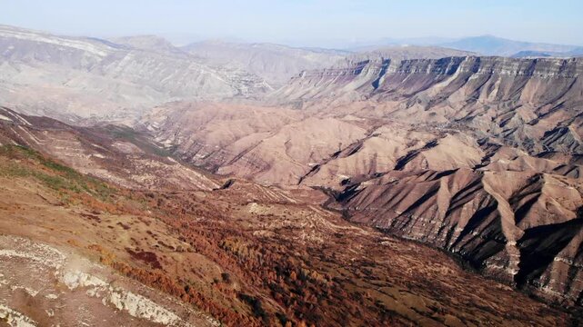 Expansive Arid Canyons Displaying Multicolored Stratified Rock Formations And Silent Wilderness . Media
