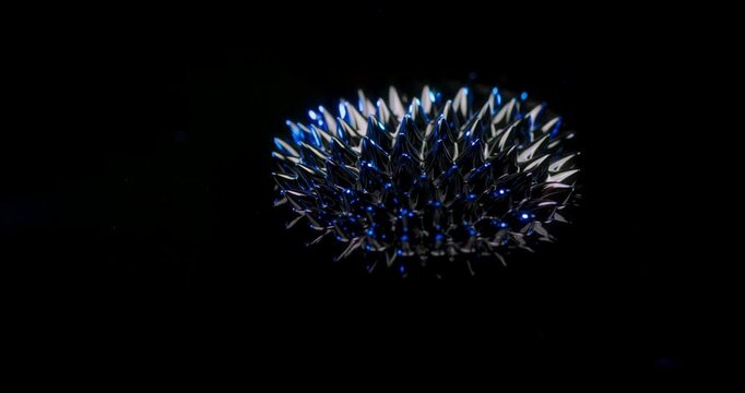Explore the captivating realm of ferrofluid visuals, as they create unique shapes against a dark backdrop, perfect for dynamic motion graphics and innovative abstract design projects