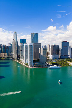 Aerial Miami Brickell downtown financial district. Miami skyline with skyscrapers along Biscayne Bay. Miami cityscape with residential towers. Miami downtown skyline.