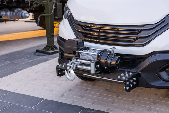 Military equipment and army equipment.. Urban mission armored recovery unit. Military urban vehicle equipped with heavyduty winch. City operation combat vehicle with powerful recovery winch