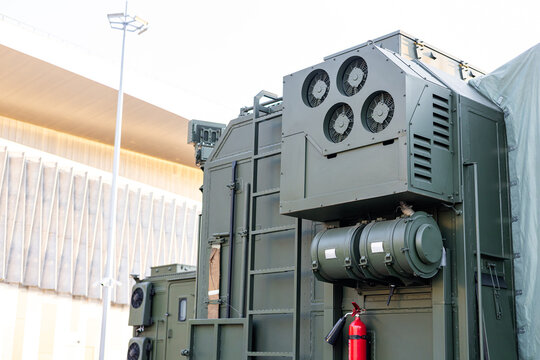 Military equipment and army equipment.. Ensuring secure deployment and readiness of military support systems. Setting up necessary logistics and safety measures for military operations
