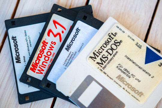 Vintage Microsoft floppy disks for Windows 3.1, MS-DOS, retro computer software installation media, early PC technology, data storage and digital nostalgia, information storage, old school technology