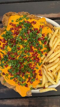 milanesa xxl con cheddar panceta y verdeo