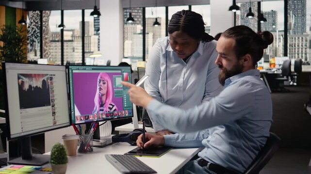 Team editing photos, retouching software on pc, for color grading, image selection for commercial materials, post production and catalog results. Commercial advertising agency content.