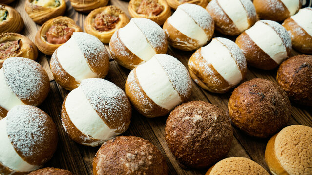 cream filled maritozzi on the table