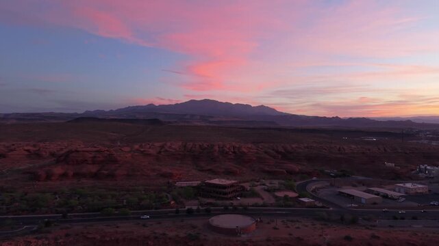 Aerial view of sunrise over red rock mountains in St George Utah USA