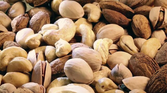 Close up of assorted nuts including pistachios cashews and almonds