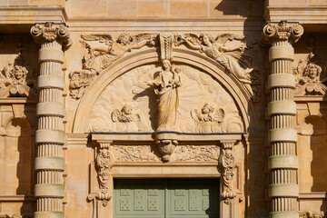 Fototapeta premium Stone carving of the Virgin Mary and Child on the baroque portal of Notre-Dame Cathedral in Le Havre, Normandy, France