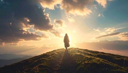 Obraz premium Silhouette figure traversing a grassy ridge toward a radiant sunset horizon