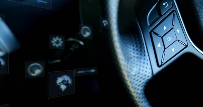 Highlighting right steering control pad showing HUD icons at dash, perforated rim, copy space