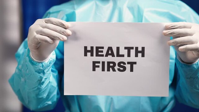 African medical professional delivering a message about prioritizing health