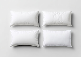 Fototapeta premium Four soft, white, rectangular pillows arranged in a four-quadrant pattern