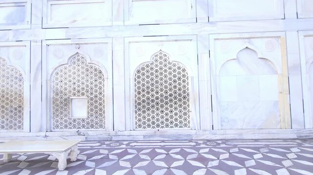 Intricate marble wall carvings and jali work at Taj Mahal, Mughal architecture with geometric patterns, arches, heritage monument showcasing Islamic art, craftsmanship and cultural tourism Agra India