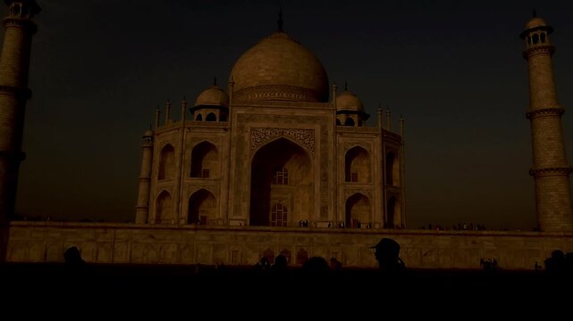 Taj Mahal Silhouette at Sunset, Dark Cinematic View Agra India.