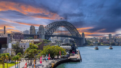 Fototapeta premium 10 April 2026 view of Sydney Harbour and Circular Quay on a Beautiful Autumn Afternoon lovely colours of the sky in Sydney NSW Australia