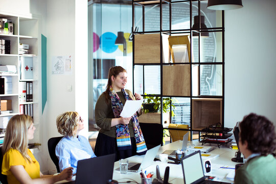 Business team presentation in modern coworking office