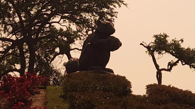 Squirrel sculpture at Ram Mandir in Ayodhya symbolizing devotion from the Ramayana. Iconic spiritual landmark with watchtower and greenery, representing Indian culture, faith, and heritage.