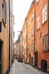 Fototapeta premium Gamla Stan, Stockholm old city in Sweden. Historic yellow and orange homes.