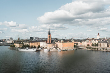 Obraz premium Gamla Stan, Stockholm old city in Sweden. Historic yellow and orange homes.