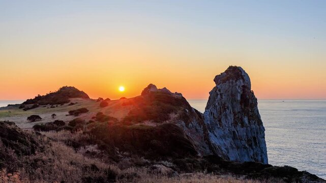 春の猿岩と夕日　タイムラプス　長崎県壱岐市 Saru-iwa and the sunset in spring. time lapse. Nagasaki Pref, Iki City.. 