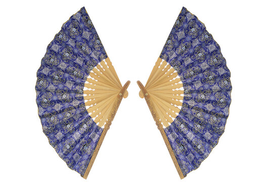Two traditional elegant folding hand fan featuring intricate blue silver batik patterns, supported by wooden ribs, classic structure, natural warmth, arranged symmetrically, isolated white background