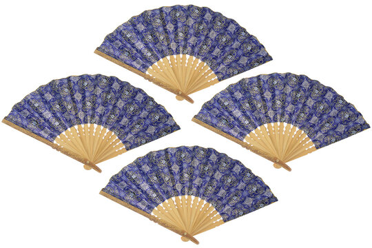 Four elegant blue patterned fans lie open, resting. Wooden frames show classic craftsmanship. Each fan displays floral motifs against with deep blue batik pattern and wooden ribs in a balance layout