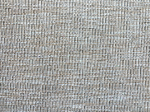 Beige woven fabric texture natural fiber background with organic pattern