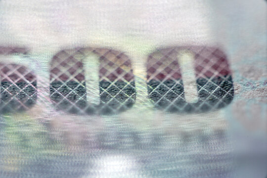 Close-Up View of a Detailed Currency Note Highlighting the Number Six Hundred