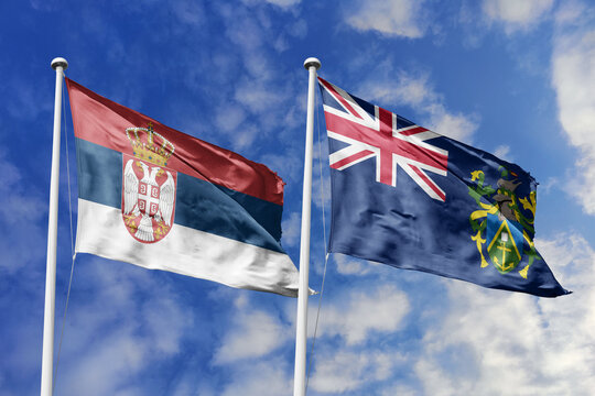 Serbia and Pitcairn Islands flags waving in a clear blue sky, symbolizing a powerful diplomacy, expanding global trade, a strategic partnership, and a shared vision of unity for a sustainable future.