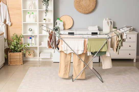 Dryer with clean clothes in laundry room
