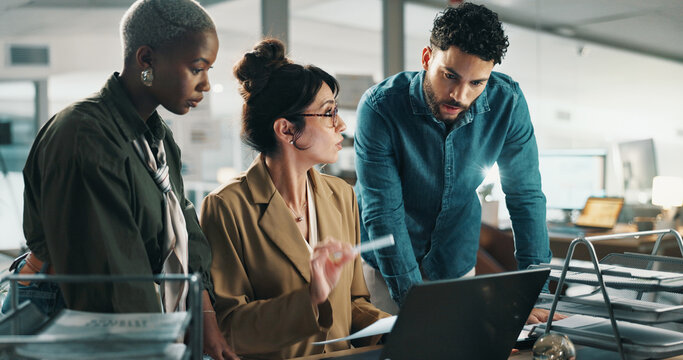 Advice, teamwork and laptop with business people in office for web design, planning and target audience research. Collaboration, idea and documents with employees in creative agency for meeting