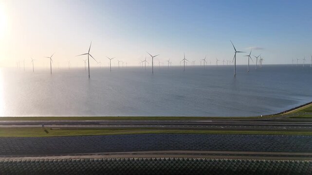 Pullback from dam revealing turbines in the IJsselmeer