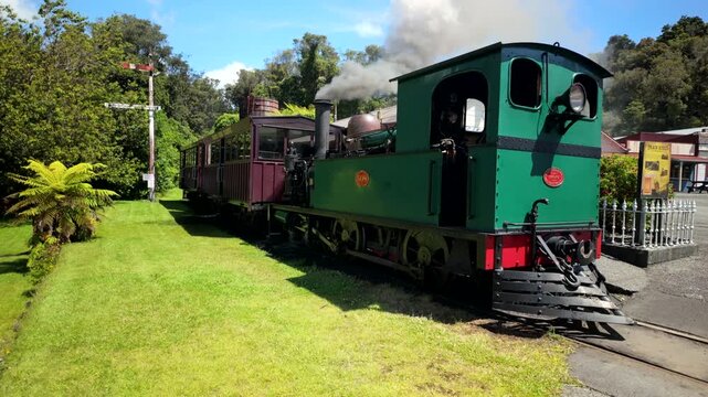 Green Steam Train At Heritage Railway Station