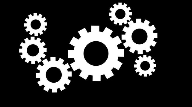 A collection of white gears arranged against a solid black background