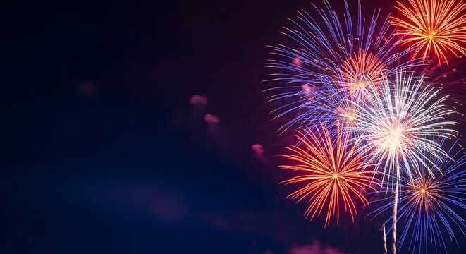Colorful fireworks exploding in night sky 1