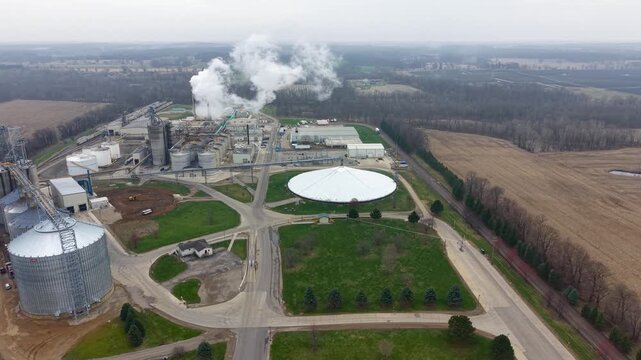 Aerial view of an ethanol plant releasing steam into the atmosphere