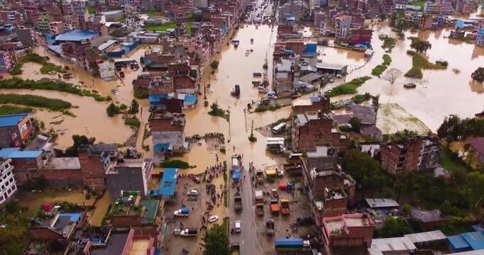 Drone shot of severe flooding in Banepa submerging buildings and blocking roads after heavy rainfall, highlighting the urgent climate crisis and urban vulnerability in Nepal.
