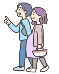 Obraz premium お出かけをする妊娠中の妻と夫の若い夫婦