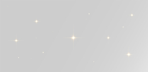Realistic golden sparkling stars with soft twinkling light effects for festive decoration overlay © Alehandro