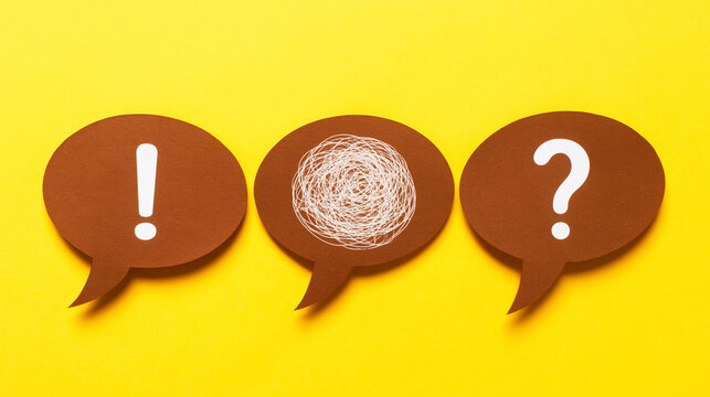 Three brown speech bubbles with different symbols on a bright yellow background