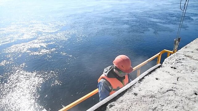 Construction site on the shore of a reservoir.