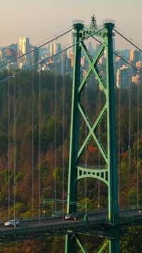 Aerial view of Lions Gate Bridge and Stanley Park at dawn. Canada